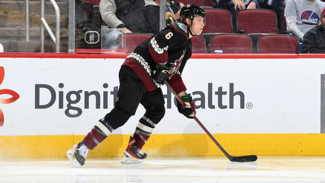 GLENDALE, ARIZONA - FEBRUARY 27: Jakob Chychrun #6 of the Arizona Coyotes looks to pass the puck against the Winnipeg Jets at Gila River Arena on February 27, 2022 in Glendale, Arizona.