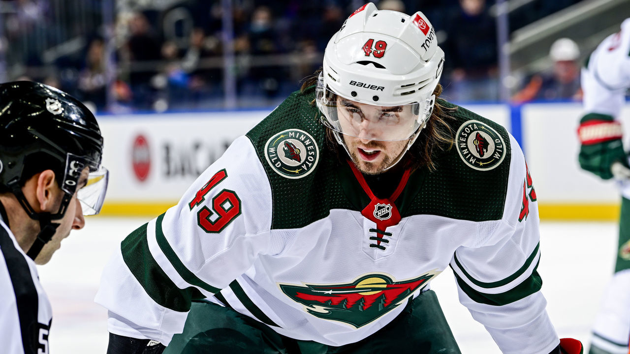 ELMONT, NEW YORK - JANUARY 30: Victor Rask #49 of the Minnesota Wild awaits the face-off against the New York Islanders at UBS Arena on January 30, 2022 in Elmont, New York.