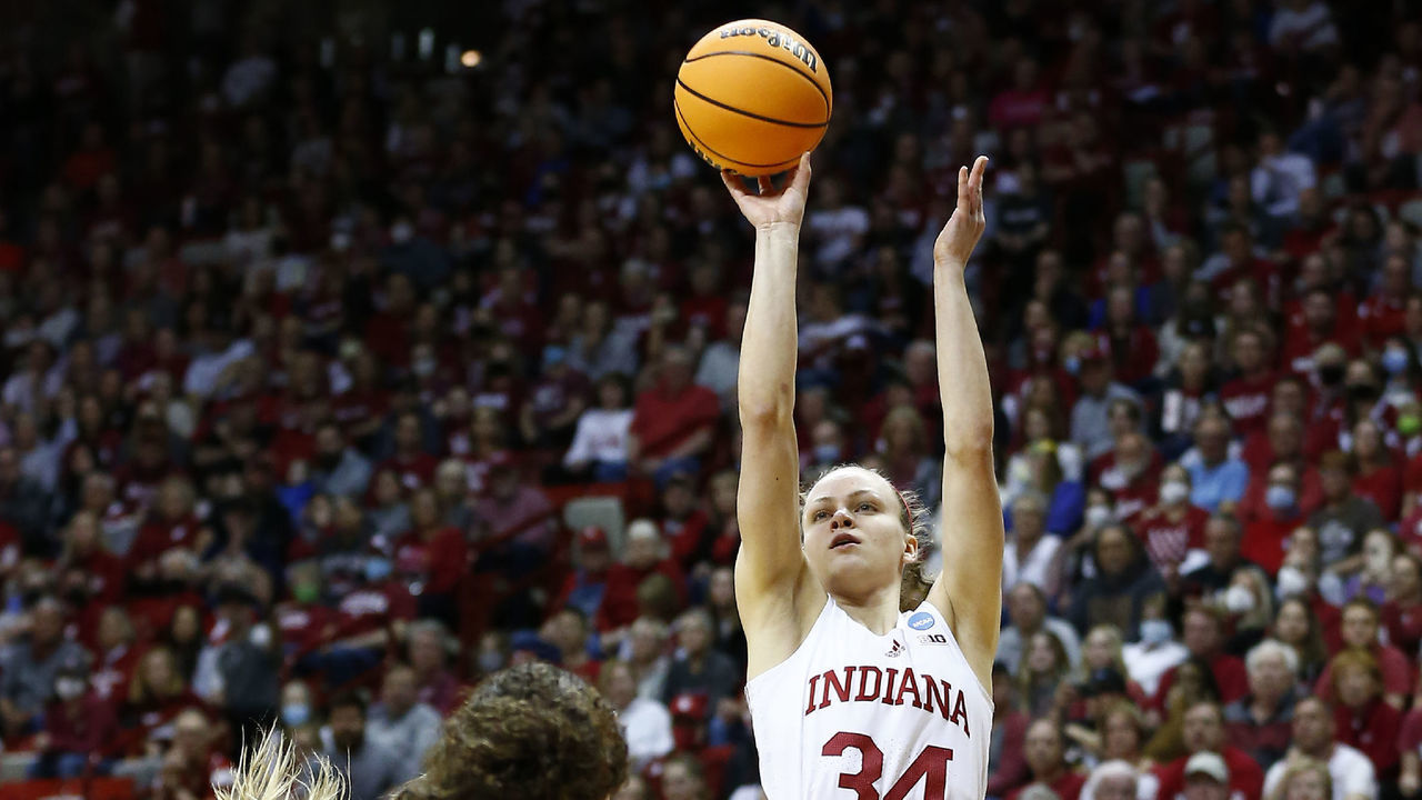 BLOOMINGTON, IN - MARCH 21: Indiana Hoosiers guard Grace Berger (34) knocks down her jump shot over Princeton Tigers guard Grace Stone (10) during a NCAA Division I Women's Basketball Championship second round game between the Princeton Tigers and the Indiana Hoosiers on March 21, 2022 at Simon Skjodt Assembly Hall in Bloomington IN.