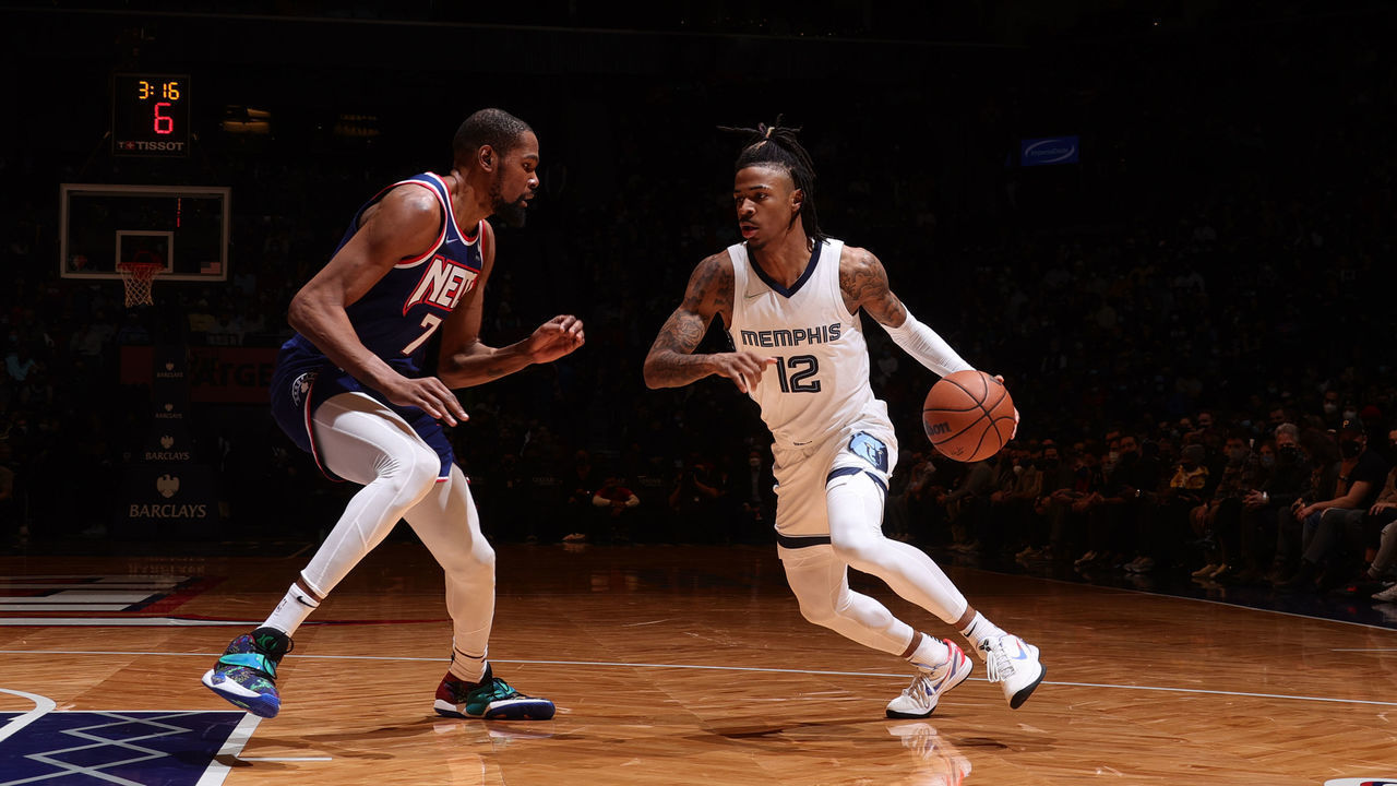 BROOKLYN, NY - JANUARY 3: Kevin Durant #7 of the Brooklyn Nets plays defense on Ja Morant #12 of the Memphis Grizzlies during the game against the Brooklyn Nets on January 3, 2022 at Barclays Center in Brooklyn, New York. Mandatory Copyright Notice: Copyright 2022 NBAE