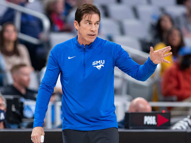 FORT WORTH, TX - MARCH 11: SMU Mustangs head coach Tim Jankovich calls out a play from the sideline during the college basketball game between the SMU Mustangs and the Tulsa Golden Hurricane on March 11, 2022, at Dickies Arena in Fort Worth, TX.