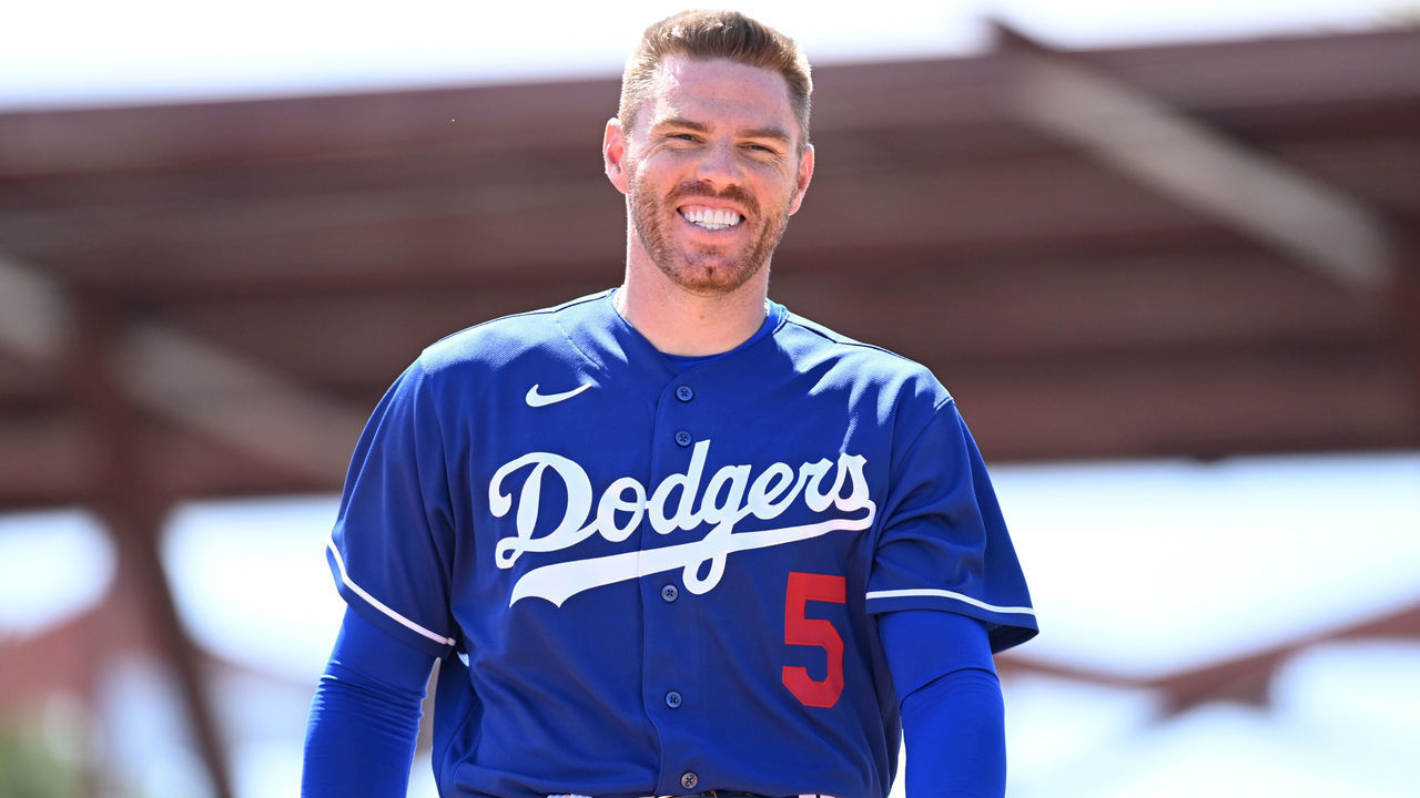 GLENDALE, ARIZONA - MARCH 22: Freddie Freeman #5 of the Los Angeles Dodgers walks to the dugout against the Cincinnati Reds during a spring training game at Camelback Ranch on March 22, 2022 in Glendale, Arizona.
