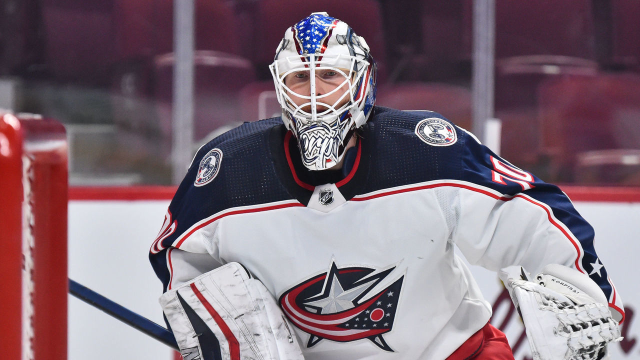MONTREAL, QC - JANUARY 30: Joonas Korpisalo #70 of the Columbus Blue Jackets tends the net during the first period against the Montreal Canadiens at Centre Bell on January 30, 2022 in Montreal, Canada. The Columbus Blue Jackets defeated the Montreal Canadiens 6-3.