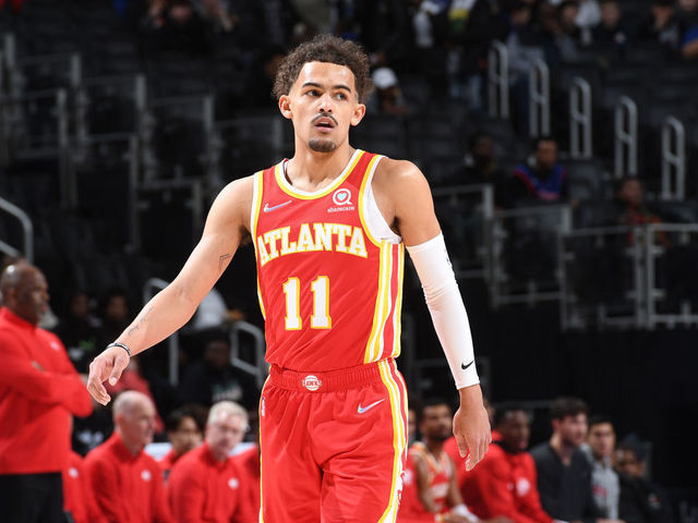 DETROIT, MI - MARCH 23: Trae Young #11 of the Atlanta Hawks looks on during the game against the Detroit Pistons on March 23, 2022 at Little Caesars Arena in Detroit, Michigan. NOTE TO USER: User expressly acknowledges and agrees that, by downloading and/or using this photograph, User is consenting to the terms and conditions of the Getty Images License Agreement. Mandatory Copyright Notice: Copyright 2022 NBAE