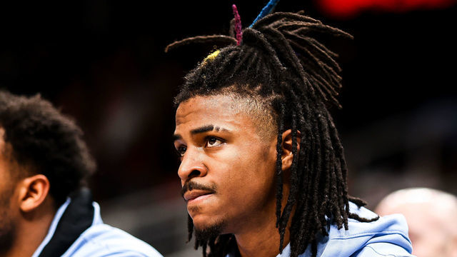 ATLANTA, GA - MARCH 18: Ja Morant #12 of the Memphis Grizzlies looks on from the bench during a game against the Atlanta Hawks at State Farm Arena on March 18, 2022 in Atlanta, Georgia.