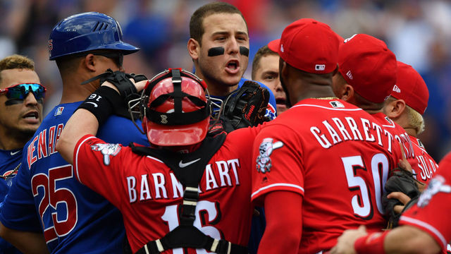 CINCINNATI, OH - MAY 19: Anthony Rizzo #44 of the Chicago Cubs confronts pitcher Amir Garrett #50 of the Cincinnati Reds at the end of the seventh inning at Great American Ball Park on May 19, 2018 in Cincinnati, Ohio. Benches cleared after Javier Baez #9 of the Chicago Cubs struck out to end the inning and got into a shouting match with Garrett.