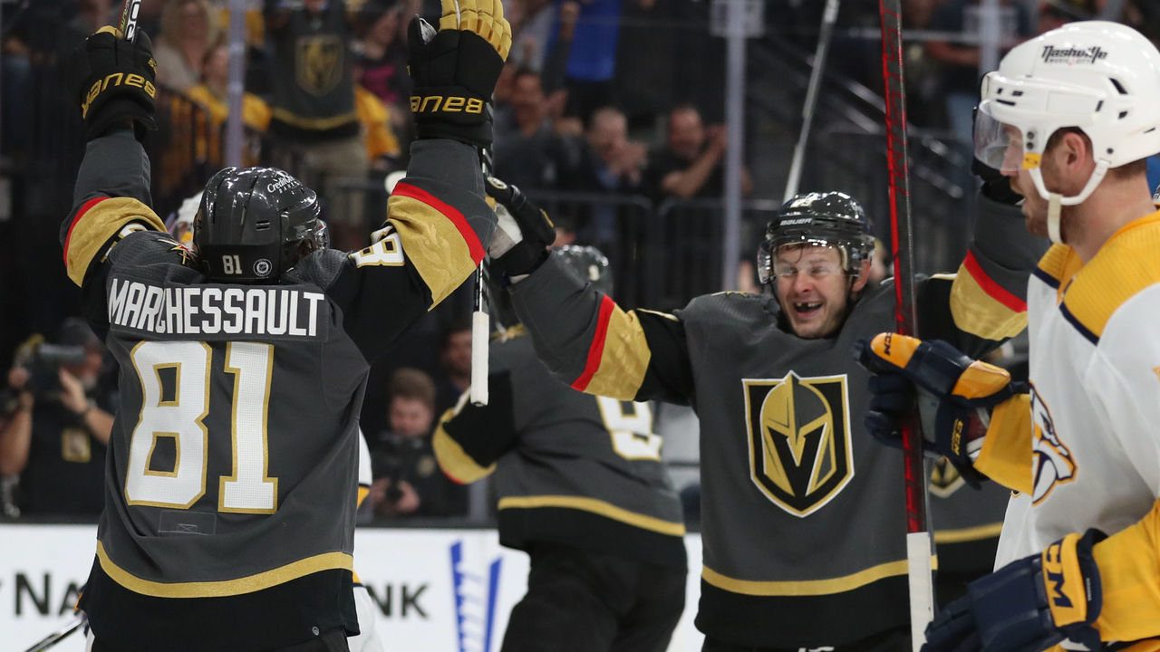 LAS VEGAS, NEVADA - MARCH 24: Jonathan Marchessault #81 and Evgenii Dadonov #63 of the Vegas Golden Knights celebrate after a goal by Jack Eichel #9 during the second period against the Nashville Predators at T-Mobile Arena on March 24, 2022 in Las Vegas, Nevada.