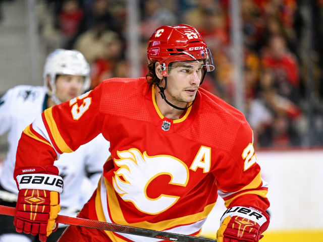 CALGARY, AB - MARCH 22: Calgary Flames Center Sean Monahan (23) in action during the second period of an NHL game where the Calgary Flames hosted the San Jose Sharks on March 22, 2022, at the Scotiabank Saddledome in Calgary, AB.