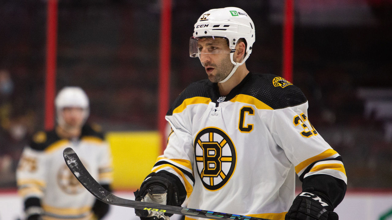 OTTAWA, ON - February 19: Patrice Bergeron #37 of the Boston Bruins skates during warm ups prior to game against the Ottawa Senators at Canadian Tire Centre on February 19, 2022.