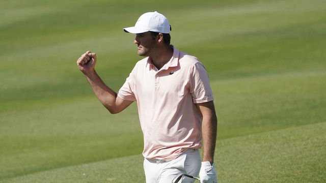 AUSTIN, TEXAS - MARCH 26: Scottie Scheffler of the United States celebrates after chipping in for eagle on the 16th hole to defeat Seamus Power of Ireland 3&2 in their quarterfinal match on the fourth day of the World Golf Championships-Dell Technologies Match Play at Austin Country Club on March 26, 2022 in Austin, Texas.