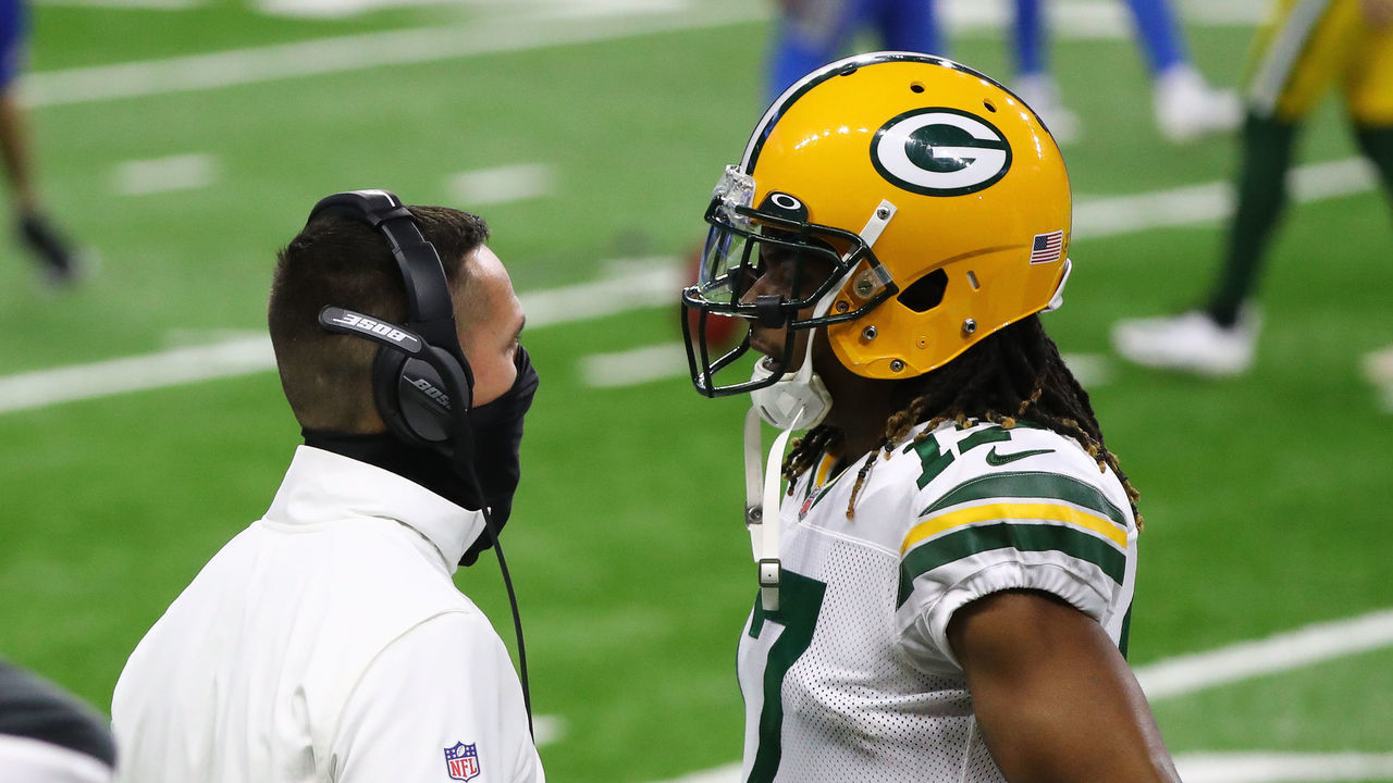 DETROIT, MICHIGAN - DECEMBER 13: Head coach Matt LaFleur of the Green Bay Packers talks with Davante Adams #17 of the Green Bay Packers before their game against the Detroit Lions at Ford Field on December 13, 2020 in Detroit, Michigan.
