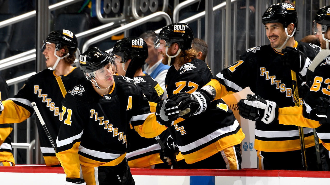 PITTSBURGH, PA - MARCH 27: Evgeni Malkin #71 of the Pittsburgh Penguins celebrates his second period goal against the Detroit Red Wings at PPG PAINTS Arena on March 27, 2022 in Pittsburgh, Pennsylvania.