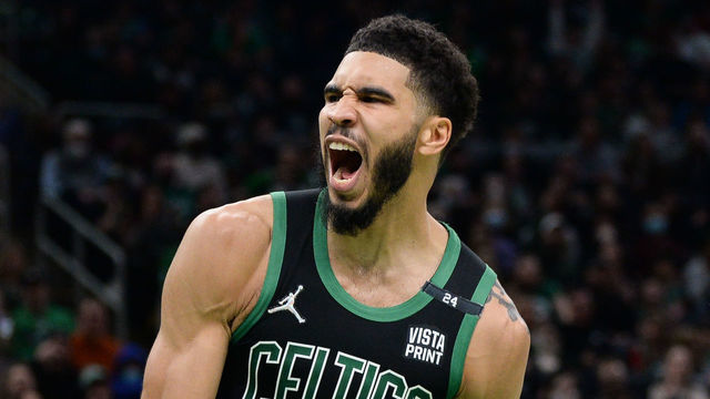 BOSTON, MA- MARCH 27: Jayson Tatum #0 of the Boston Celtics reacts after dunking the ball against the Minnesota Timberwolves in the second half at TD Garden on March 27, 2022 in Boston, Massachusetts.