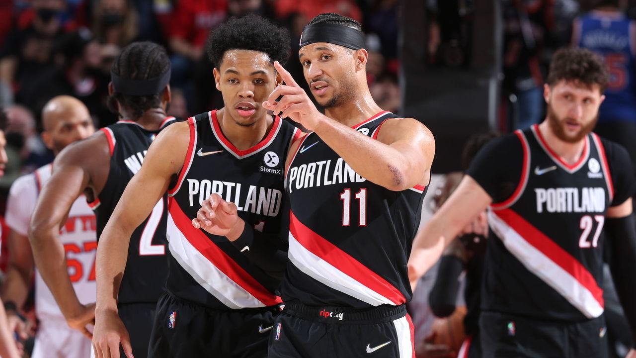 PORTLAND, OR - FEBRUARY 11: Josh Hart #11 of the Portland Trail Blazers talks with Anfernee Simons #1 of the Portland Trail Blazers during the game against the New York Knicks on February 11, 2022 at the Moda Center Arena in Portland, Oregon. Mandatory Copyright Notice: Copyright 2022 NBAE