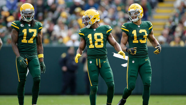 GREEN BAY, WISCONSIN - OCTOBER 24: Davante Adams #17, Randall Cobb #18 and Allen Lazard #13 of the Green Bay Packers line up before the snap against the Washington Football Team at Lambeau Field on October 24, 2021 in Green Bay, Wisconsin. Green Bay defeated Washington 24-10.