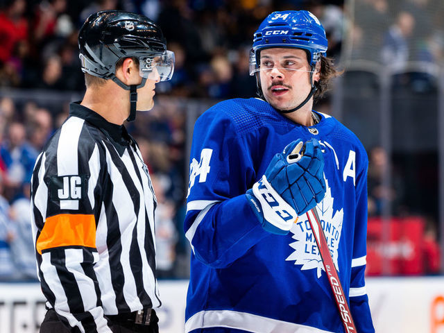 TORONTO, ON - FEBRUARY 20: Auston Matthews #34 of the Toronto Maple Leafs talks to referee Jean Hebert #15 at an NHL game against the Pittsburgh Penguins during the first period at the Scotiabank Arena on February 20, 2020 in Toronto, Ontario, Canada.