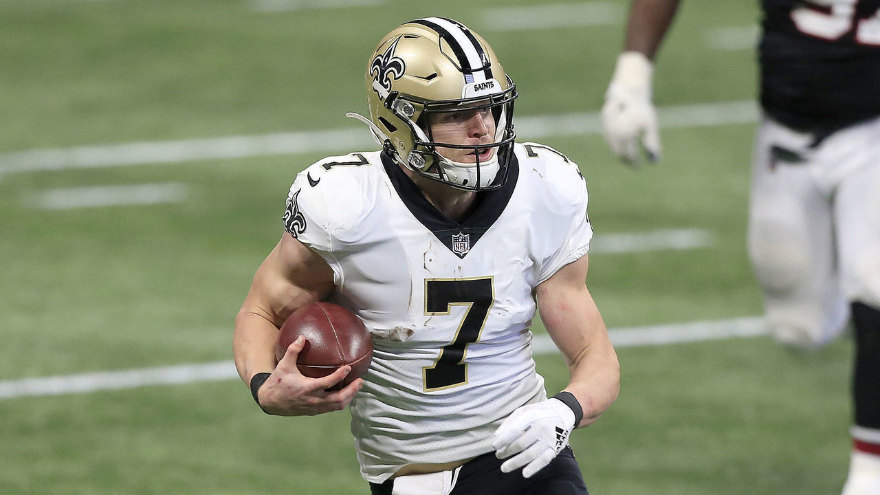 ATLANTA, GA - DECEMBER 06: Quarterback Taysom Hill #7 of the New Orleans Saints scrambles during the week 13 NFL football game between the Atlanta Falcons and the New Orleans Saints on December 06, 2020 at the Mercedes-Benz Stadium in Atlanta, Georgia.