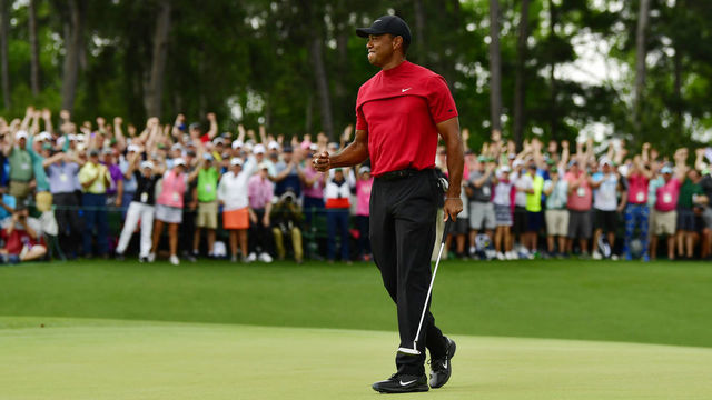 Masters champion Tiger Woods celebrates on the No. 18 green after winning the Masters at Augusta National Golf Club, Sunday, April 14, 2019.