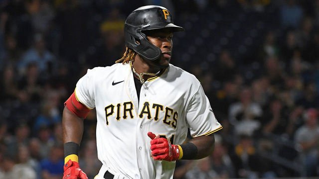 PITTSBURGH, PA - OCTOBER 02: Oneil Cruz #61 of the Pittsburgh Pirates runs to first base after hitting a single in the seventh inning of his major league debut during the game against the Cincinnati Reds at PNC Park on October 2, 2021 in Pittsburgh, Pennsylvania.