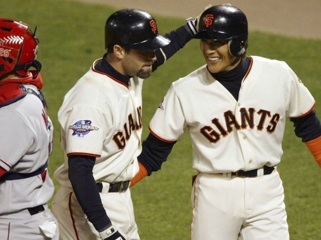 Nippon-Ham Fighters manager Tsuyoshi Shinjo and players take part