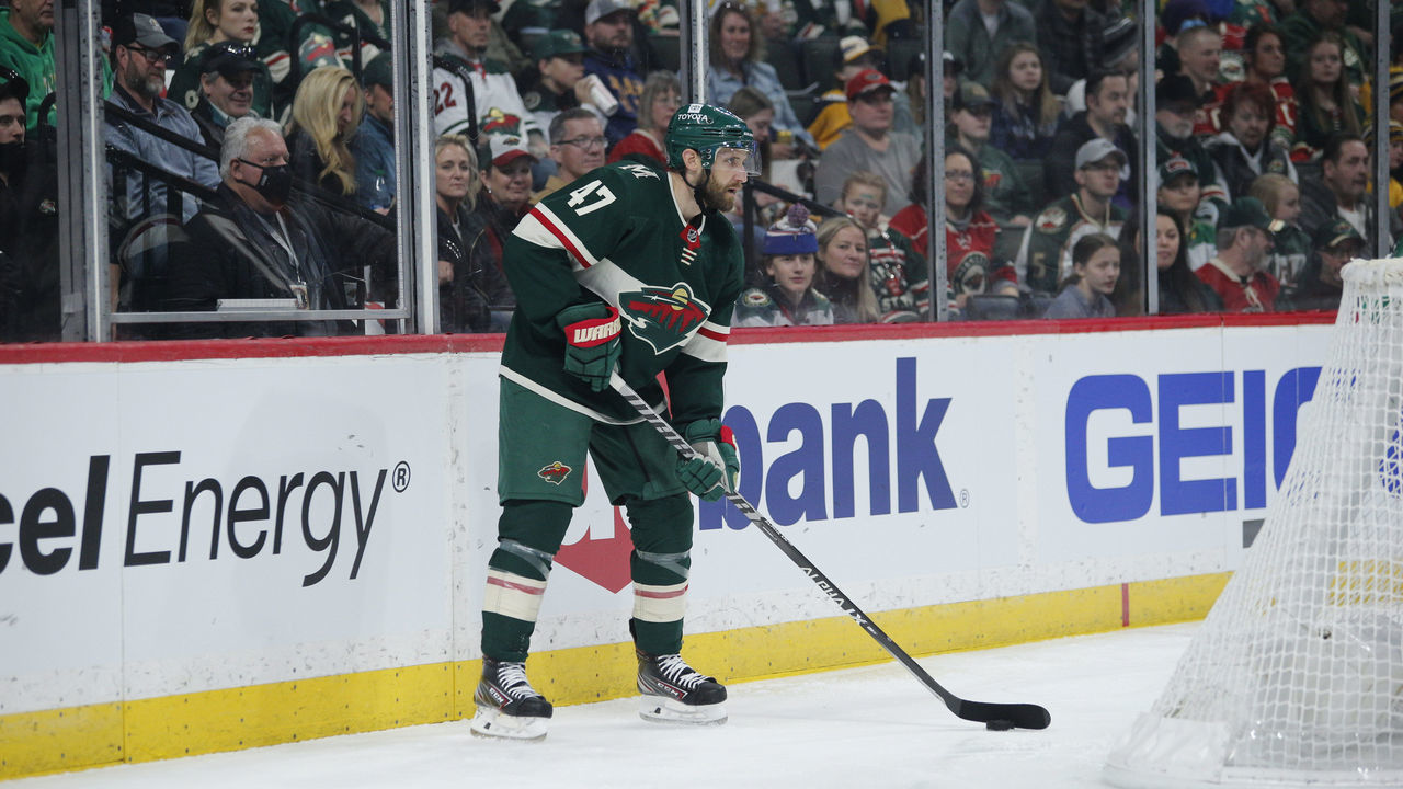 ST. PAUL, MN - MARCH 13: Minnesota Wild Defenceman Alex Goligoski (47) looks to pass from behind his net during the NHL game between the Nashville Predators and Minnesota Wild, March 13th, 2022, at Xcel Energy Center in St. Paul, MN.