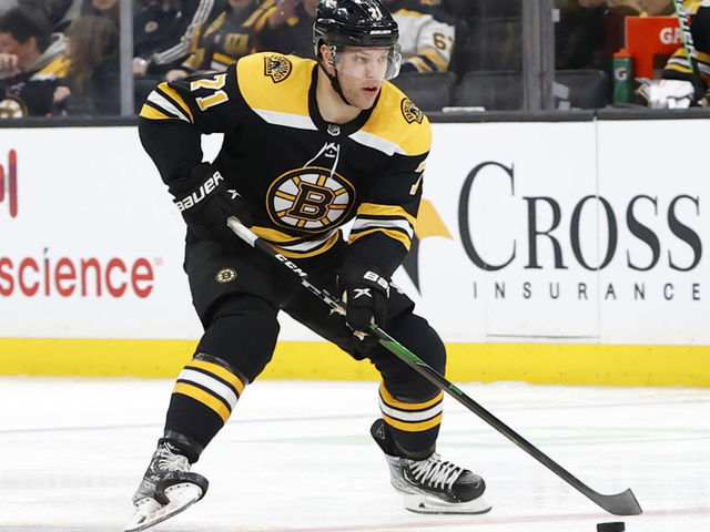 BOSTON, MA - MARCH 24: Boston Bruins left wing Taylor Hall (71) skates through the neutral zone during a game between the Boston Bruins and the Tampa Bay Lightning on March 24, 2022, at TD Garden in Boston, Massachusetts.