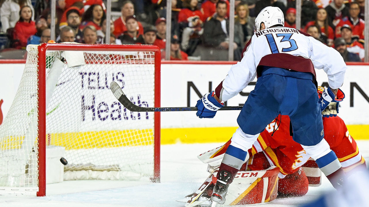 CALGARY, AB - MARCH 29: Colorado Avalanche Left Wing Valeri Nichushkin (13) scores on Calgary Flames Goalie Jacob Markstrom (25) during the third period of an NHL game where the Calgary Flames hosted the Colorado Avalanche on March 29, 2022, at the Scotiabank Saddledome in Calgary, AB.