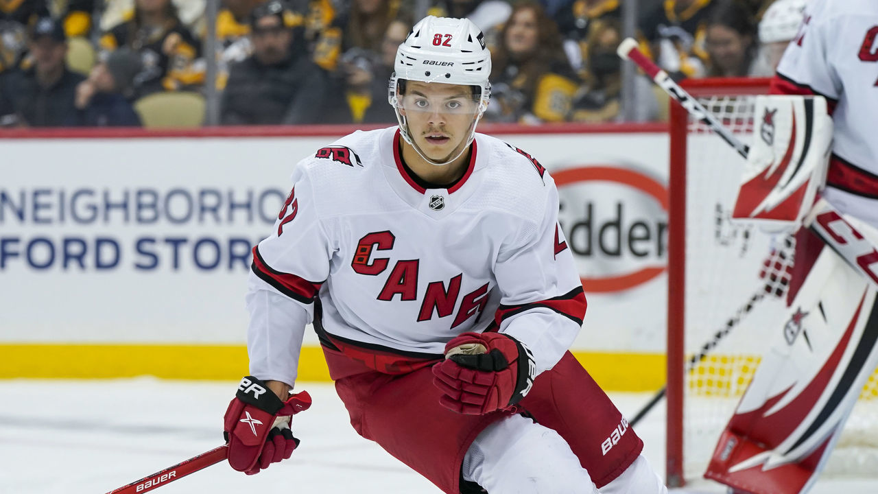 PITTSBURGH, PA - FEBRUARY 20: Carolina Hurricanes center Jesperi Kotkaniemi (82) looks on during the first period in the NHL game between the Pittsburgh Penguins and the Carolina Hurricanes on February 20, 2022, at PPG Paints Arena in Pittsburgh, PA.