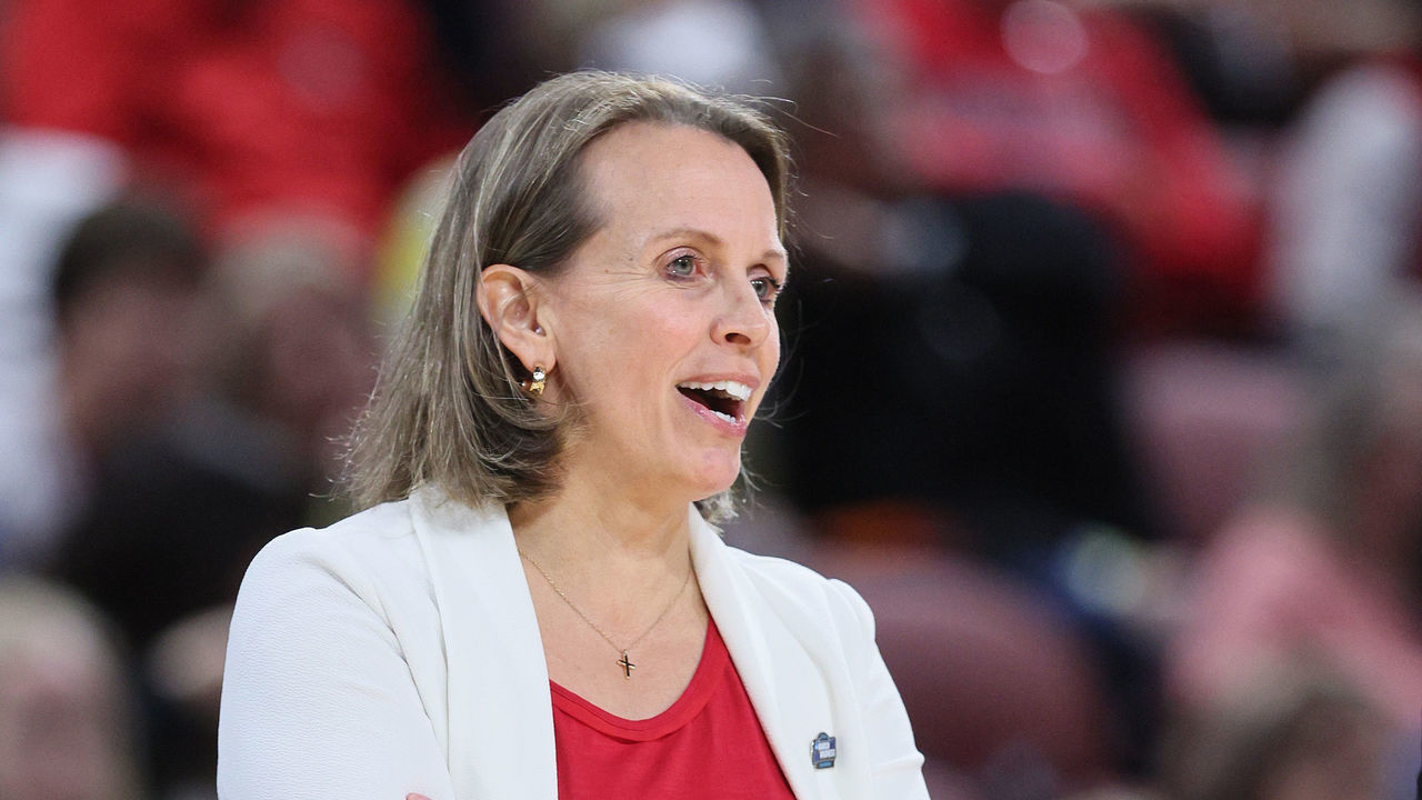 WICHITA, KANSAS - MARCH 26: Dawn Plitzuweit the head coach of the South Dakota Coyotes against the Michigan Wolverines in the Sweet 16 round of the NCAA Women's Basketball Tournament at Intrust Bank Arena on March 26, 2022 in Wichita, Kansas.