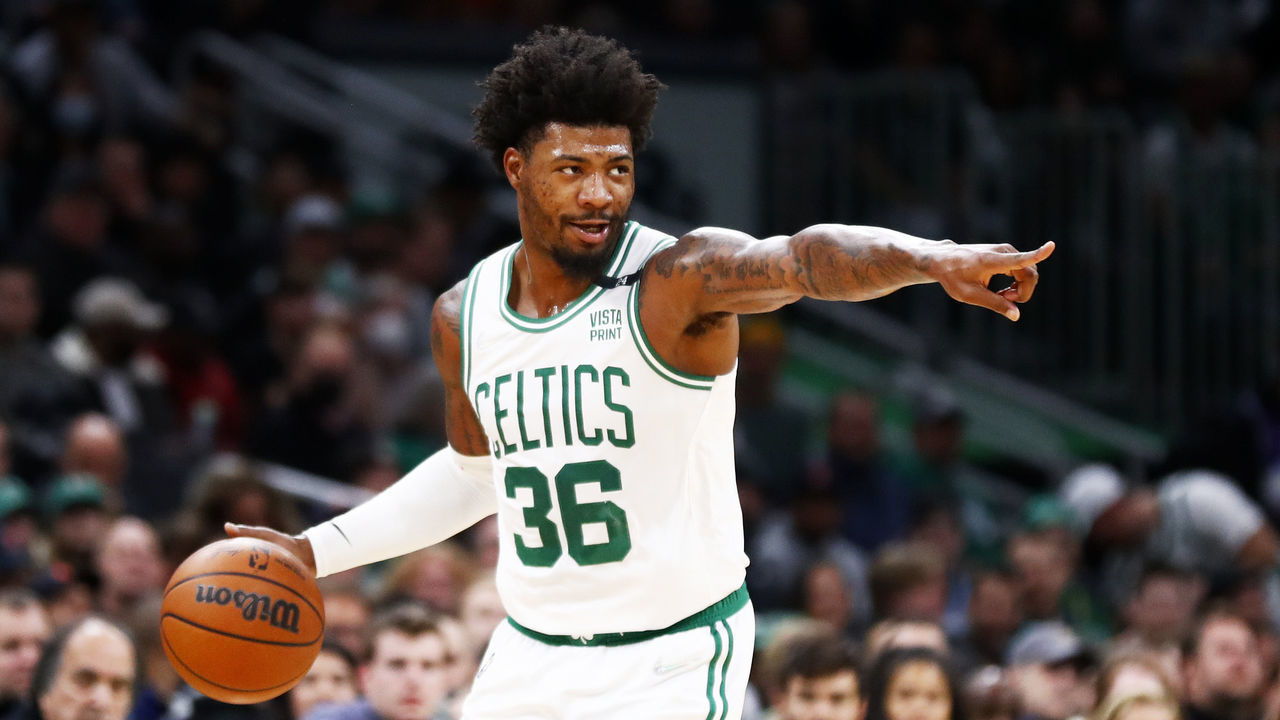 BOSTON, MASSACHUSETTS - MARCH 23: Marcus Smart #36 of the Boston Celtics brings the ball up court during the first quarter of the game against the Utah Jazz at TD Garden on March 23, 2022 in Boston, Massachusetts.