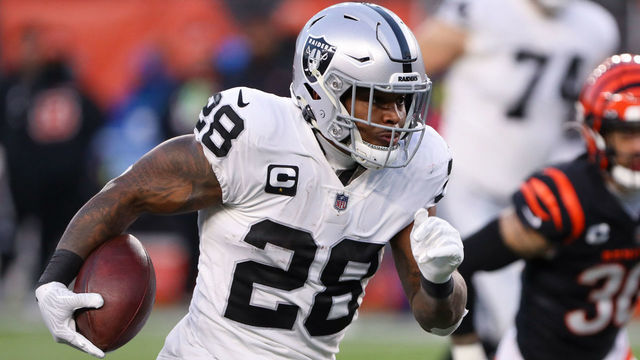 CINCINNATI, OH - JANUARY 15: Las Vegas Raiders running back Josh Jacobs (28) carries the ball during the Wild Card game against the Las Vegas Raiders and the Cincinnati Bengals on January 15, 2022, at Paul Brown Stadium in Cincinnati, OH.
