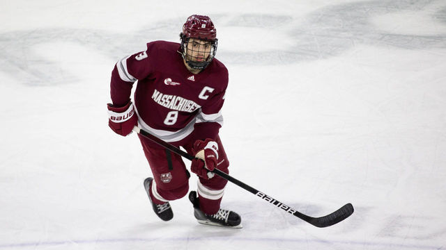 LOWELL, MA - JANUARY 30: Bobby Trivigno #8 of the Massachusetts Minutemen skates against the UMass Lowell River Hawks during NCAA men's hockey at the Tsongas Center on January 30, 2022 in Lowell, Massachusetts. The Minutemen won 4-3.