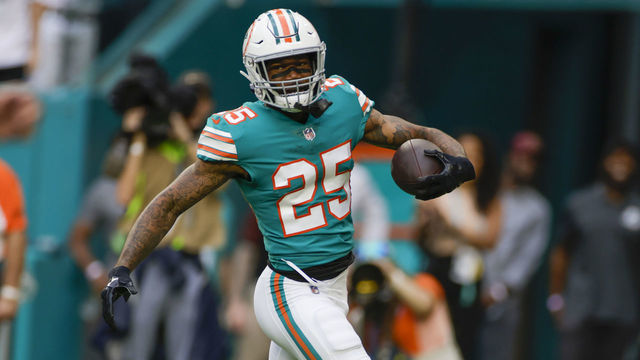 MIAMI GARDENS, FL - JANUARY 09: Miami Dolphins cornerback Xavien Howard (25) returns an interception for a touchdown during the game between the New England Patriots and the Miami Dolphins on January 9, 2022 at Hard Rock Stadium in Miami Gardens, Fl.