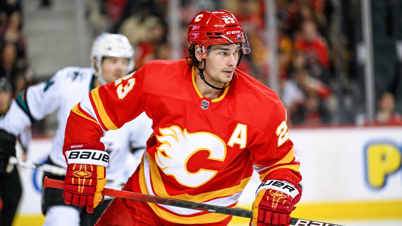 CALGARY, AB - MARCH 22: Calgary Flames Center Sean Monahan (23) in action during the second period of an NHL game where the Calgary Flames hosted the San Jose Sharks on March 22, 2022, at the Scotiabank Saddledome in Calgary, AB.