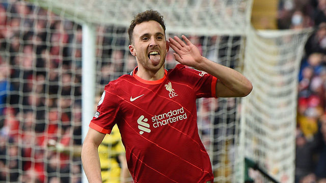 LIVERPOOL, ENGLAND - APRIL 02: (THE SUN NOUT. THE SUN ON SUNDAY NPUT) Diogo Jota of Liverpool celebrates after scoring the opening goal during the Premier League match between Liverpool and Watford at Anfield on April 02, 2022 in Liverpool, England.