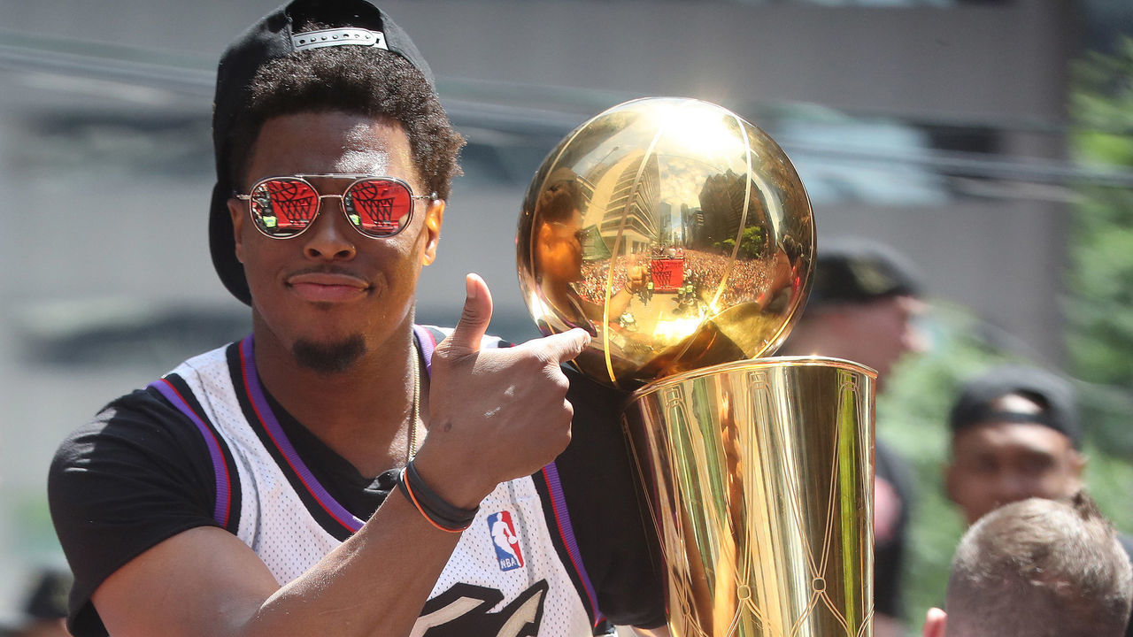 TORONTO, ON- JUNE 17 - Kyle Lowry with the Larry O'Brien NBA Championship Trophy as the Toronto Raptors hold their victory parade after beating the Golden State Warriors in the NBA Finals in Toronto. June 17, 2019. (Steve Russell/Toronto Star via Getty Images)
