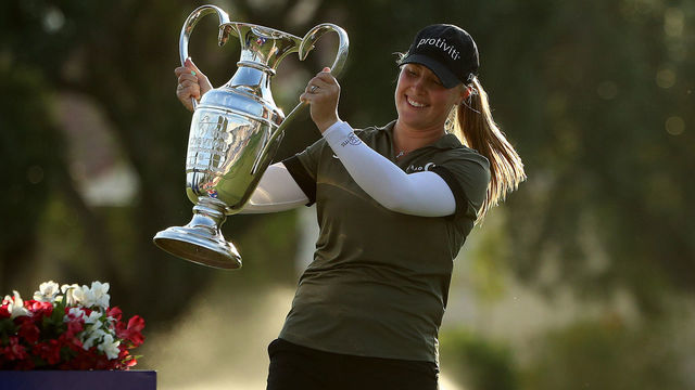 RANCHO MIRAGE, CALIFORNIA - APRIL 03: Jennifer Kupcho of the United States celebrates with The Dinah Shore Trophy after winning The Chevron Championship at The Westin Mission Hills Golf Resort & Spa on April 03, 2022 in Rancho Mirage, California.