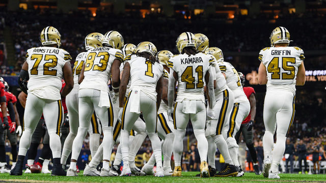 NEW ORLEANS, LA - OCTOBER 31: The Saints offense huddles near its own endzone during the football game between the Tampa Bay Buccaneers and New Orleans Saints at Caesar's Superdome on October 31, 2021 in New Orleans, LA.