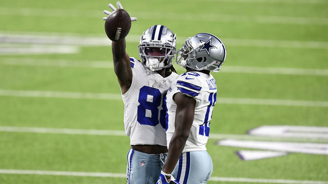 MINNEAPOLIS, MINNESOTA - NOVEMBER 22: CeeDee Lamb #88 of the Dallas Cowboys celebrates with teammate Michael Gallup #13 following a touchdown reception during their game against the Minnesota Vikings at U.S. Bank Stadium on November 22, 2020 in Minneapolis, Minnesota.
