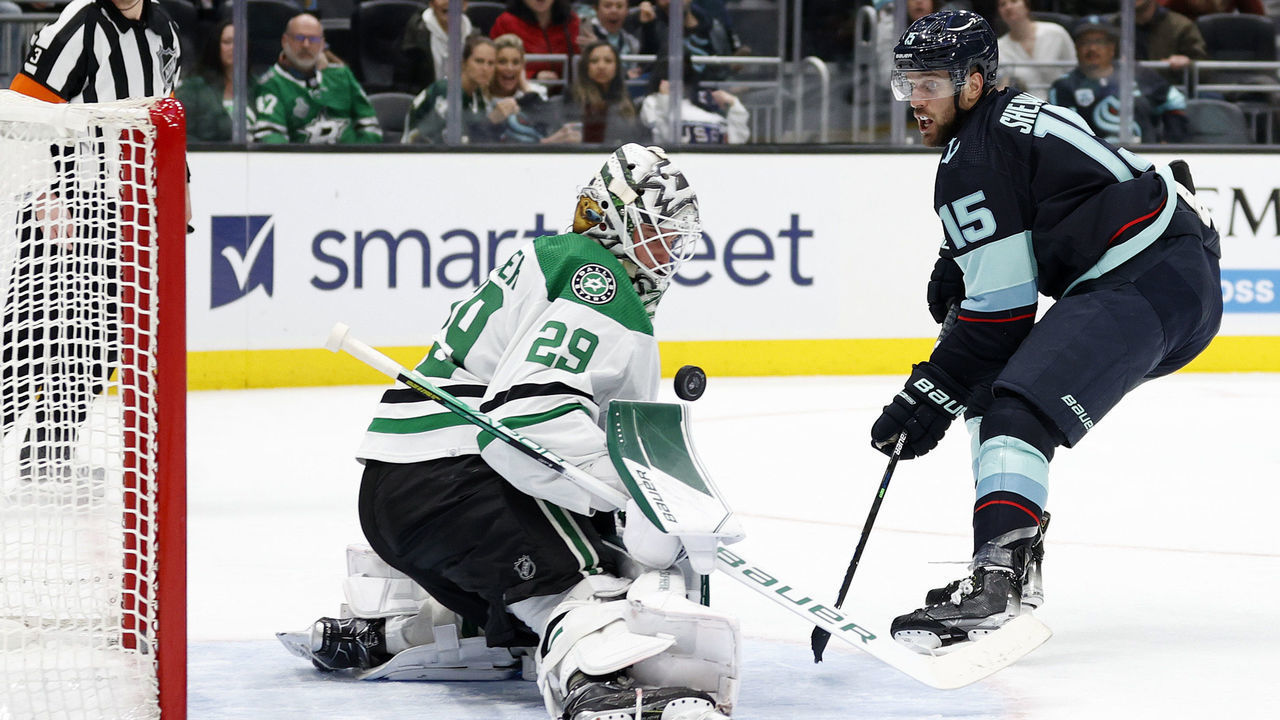 SEATTLE, WASHINGTON - APRIL 03: Jake Oettinger #29 of the Dallas Stars makes a save against Riley Sheahan #15 of the Seattle Kraken during the second period at Climate Pledge Arena on April 03, 2022 in Seattle, Washington.