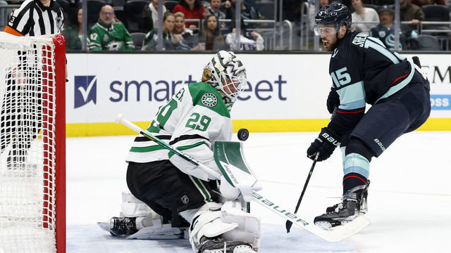 SEATTLE, WASHINGTON - APRIL 03: Jake Oettinger #29 of the Dallas Stars makes a save against Riley Sheahan #15 of the Seattle Kraken during the second period at Climate Pledge Arena on April 03, 2022 in Seattle, Washington.