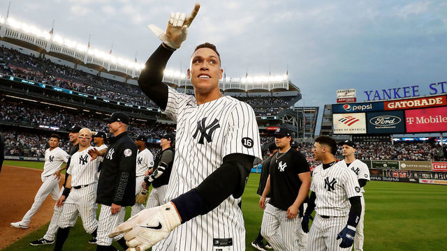 NEW YORK, NEW YORK - OCTOBER 03: Aaron Judge #99 of the New York Yankees celebrates after hitting a walk-off single in the bottom of the ninth inning to beat the Tampa Bay Rays, 1-0, clinching an American League Wild Card spot at Yankee Stadium on October 03, 2021 in New York City.