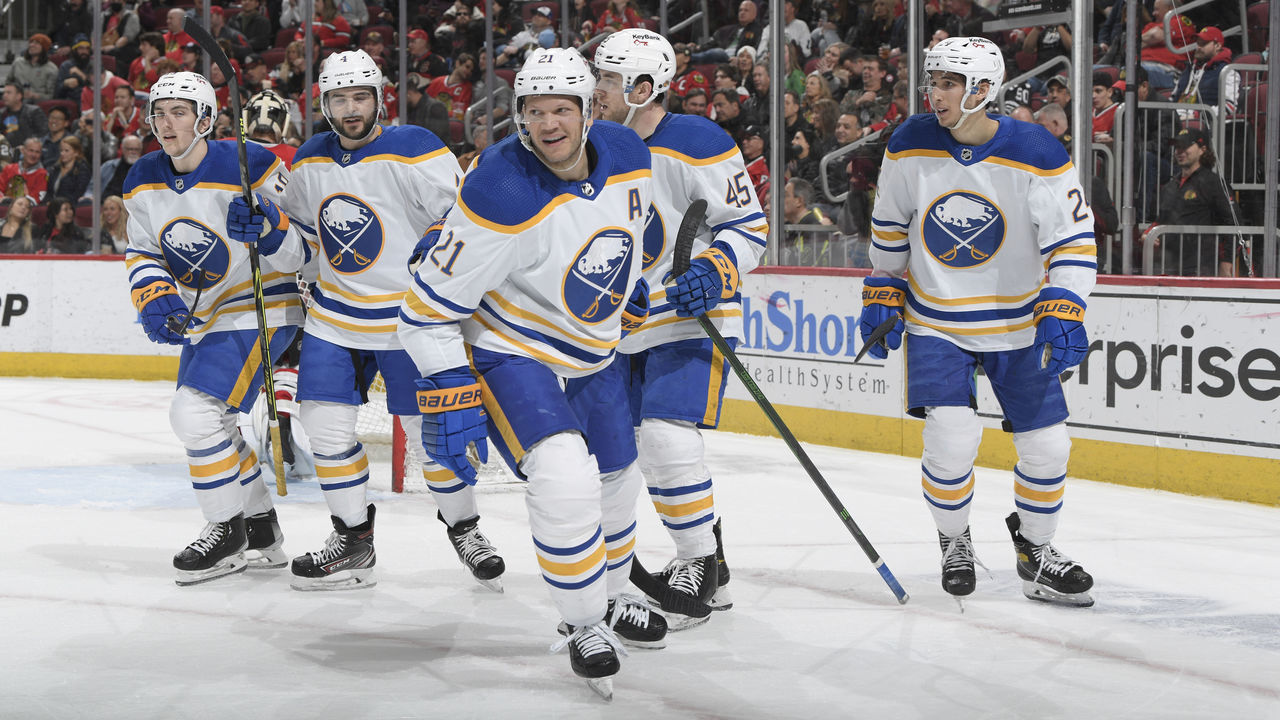 CHICAGO, ILLINOIS - MARCH 28: Kyle Okposo #21 of the Buffalo Sabres skates ahead of teammates after celebrating his goal against the Chicago Blackhawks in the second period at United Center on March 28, 2022 in Chicago, Illinois.
