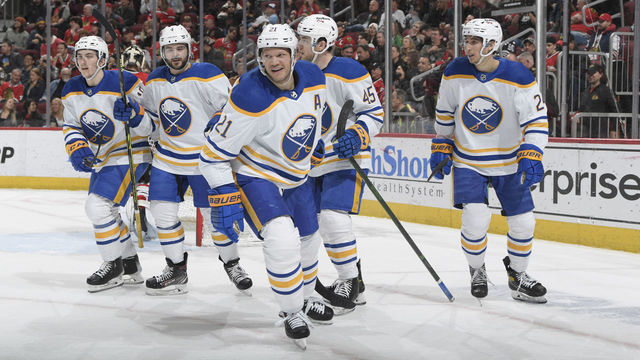 CHICAGO, ILLINOIS - MARCH 28: Kyle Okposo #21 of the Buffalo Sabres skates ahead of teammates after celebrating his goal against the Chicago Blackhawks in the second period at United Center on March 28, 2022 in Chicago, Illinois.