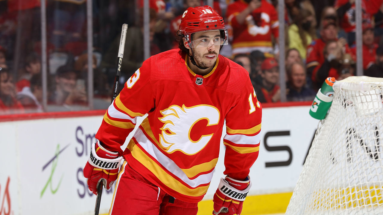 CALGARY, AB - MARCH 22: Johnny Gaudreau #13 of the Calgary Flames skates between whistles against the San Jose Sharks at Scotiabank Saddledome on March 22, 2022 in Calgary, Alberta, Canada.