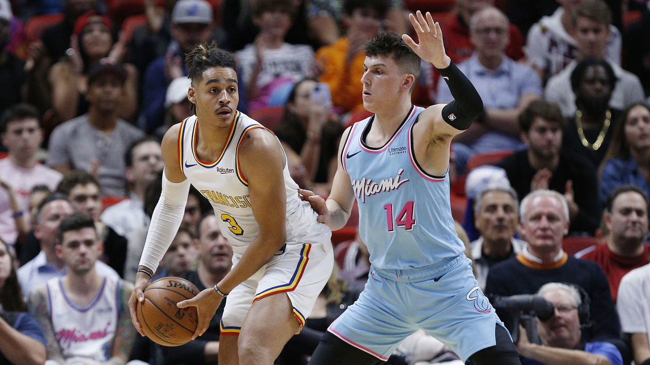 MIAMI, FLORIDA - NOVEMBER 29: Jordan Poole #3 of the Golden State Warriors is guarded by Tyler Herro #14 of the Miami Heat during the second half at American Airlines Arena on November 29, 2019 in Miami, Florida. NOTE TO USER: User expressly acknowledges and agrees that, by downloading and/or using this photograph, user is consenting to the terms and conditions of the Getty Images License Agreement.