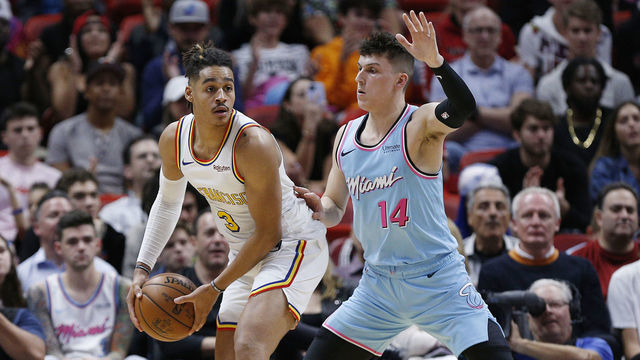 MIAMI, FLORIDA - NOVEMBER 29: Jordan Poole #3 of the Golden State Warriors is guarded by Tyler Herro #14 of the Miami Heat during the second half at American Airlines Arena on November 29, 2019 in Miami, Florida. NOTE TO USER: User expressly acknowledges and agrees that, by downloading and/or using this photograph, user is consenting to the terms and conditions of the Getty Images License Agreement.