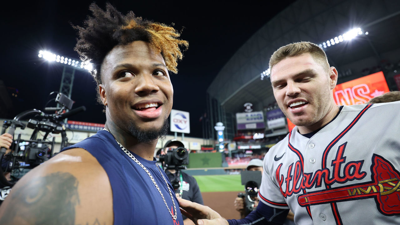 HOUSTON, TEXAS - NOVEMBER 02: Freddie Freeman #5 and Ronald Acuna Jr. #13 of the Atlanta Braves celebrate their 7-0 victory against the Houston Astros in Game Six to win the 2021 World Series at Minute Maid Park on November 02, 2021 in Houston, Texas.
