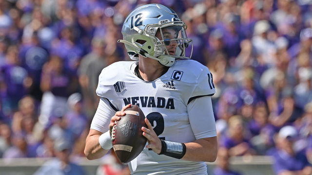 MANHATTAN, KS - SEPTEMBER 18: Quarterback Carson Strong #12 of the Nevada Wolf Pack drops back to pass against the Kansas State Wildcats during the first half at Bill Snyder Family Football Stadium on September 18, 2021 in Manhattan, Kansas.