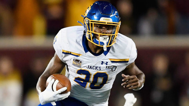 MINNEAPOLIS, MN - AUGUST 29: Pierre Strong Jr. #20 of the South Dakota State Jackrabbits avoids a tackles by Braelen Oliver #14 of the Minnesota Gophers during the fourth quarter of the game on August 29, 2018 at TCF Bank Stadium in Minneapolis, Minnesota. The Gophers defeated the Jackrabbits 28-21.